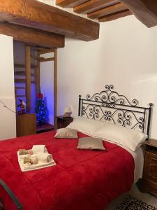 A bed or beds in a room at Affittacamere Mirella