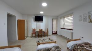 Ένα ή περισσότερα κρεβάτια σε δωμάτιο στο Rooms Stefan