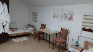 Ένα ή περισσότερα κρεβάτια σε δωμάτιο στο Rooms Stefan