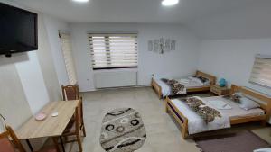 Ένα ή περισσότερα κρεβάτια σε δωμάτιο στο Rooms Stefan