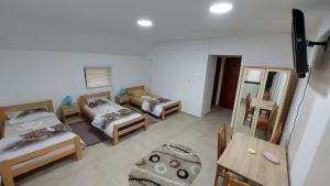 Ένα ή περισσότερα κρεβάτια σε δωμάτιο στο Rooms Stefan