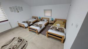 Ένα ή περισσότερα κρεβάτια σε δωμάτιο στο Rooms Stefan