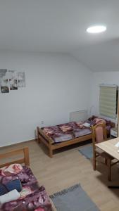 Ένα ή περισσότερα κρεβάτια σε δωμάτιο στο Rooms Stefan