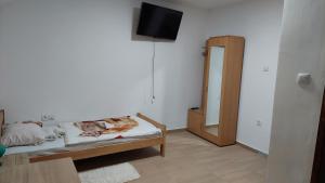 Ένα ή περισσότερα κρεβάτια σε δωμάτιο στο Rooms Stefan