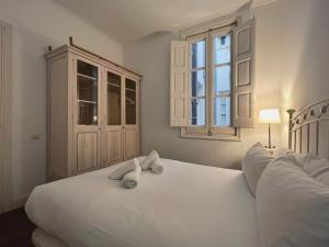 Posteľ alebo postele v izbe v ubytovaní Stay Unique Apartments Bruc