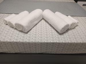 Łóżko lub łóżka w pokoju w obiekcie Appartamento Copernico