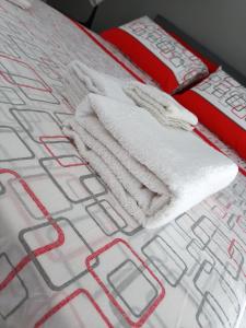 Łóżko lub łóżka w pokoju w obiekcie Appartamento Copernico