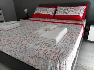 Łóżko lub łóżka w pokoju w obiekcie Appartamento Copernico