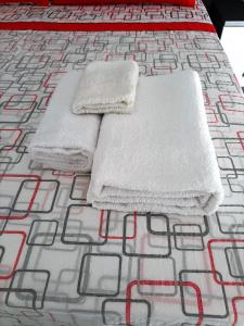 Łóżko lub łóżka w pokoju w obiekcie Appartamento Copernico