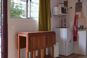 Kuchyň nebo kuchyňský kout v ubytování Cabaña en Punta del Diablo 001 + 9 fotografií