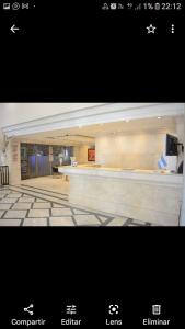 ein Bild einer Lobby mit Rezeption in der Unterkunft MZA Departamentos in Mendoza