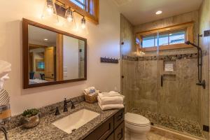 a bathroom with a toilet sink and a shower at Banner Sky in Banner Elk +16 photos