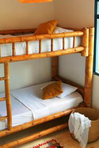 Postel nebo postele na pokoji v ubytování Casa Mostaza-Ecolodge