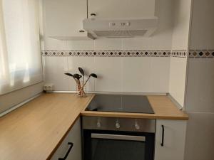 a kitchen with a sink and a counter top at Casa Jesùs in Ontinyent