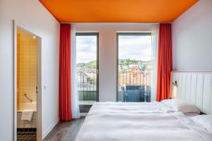 Krevet ili kreveti u jedinici u okviru objekta Park Inn by Radisson Stuttgart