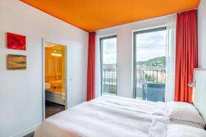 Krevet ili kreveti u jedinici u okviru objekta Park Inn by Radisson Stuttgart