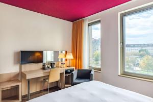 Krevet ili kreveti u jedinici u okviru objekta Park Inn by Radisson Stuttgart
