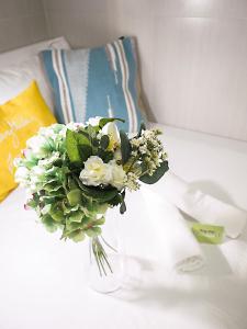 Katil atau katil-katil dalam bilik di Joyous Guest House