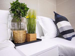 Katil atau katil-katil dalam bilik di Joyous Guest House