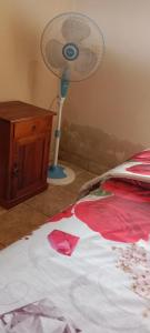 Letto o letti in una camera di Agung Pring Homestay