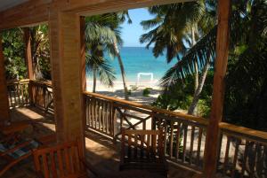 Photo de la galerie de l'établissement LÌlot Beach Chalets, à Glacis