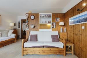 Posteľ alebo postele v izbe v ubytovaní Résidence Coeur d'Argentière 107 - Happy Rentals