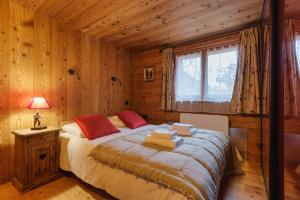 Posteľ alebo postele v izbe v ubytovaní Chalet de l'Alpage - Happy Rentals