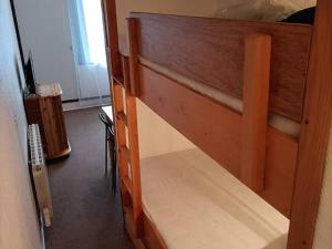 ajar view of a bunk bed in a room at Studio confortable à La Pierre St Martin, proche des pistes, avec loggia et ascenseur. - FR-1-602-64 in Arette