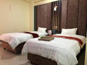 Hotel Hot Pot, Dhangadhi客房内的一张或多张床位