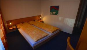 Letto o letti in una camera di Hotel Eigerblick