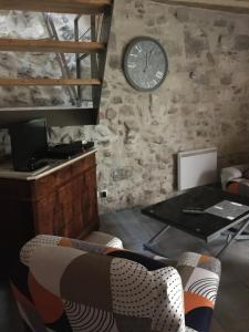 Posedenie v ubytovaní Petite maison sur jardin secret