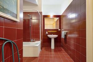 A bathroom at Teatro Massimo Lovely Flat with Balconies
