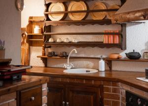 A kitchen or kitchenette at Arachova Wooden Chalet