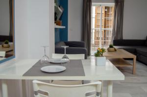 Posedenie v ubytovaní Novam Apartament
