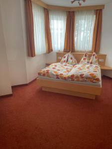 Postel nebo postele na pokoji v ubytování Apartment Sonnblick