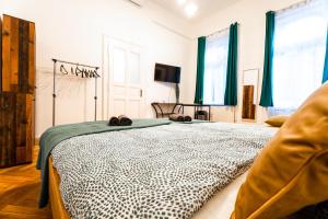 Posteľ alebo postele v izbe v ubytovaní Palace Quarter Suite