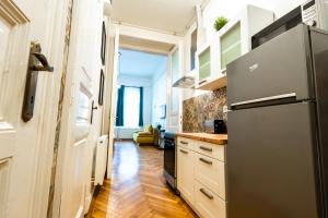 Kuchyňa alebo kuchynka v ubytovaní Palace Quarter Suite