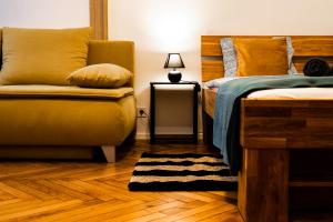 Posteľ alebo postele v izbe v ubytovaní Palace Quarter Suite