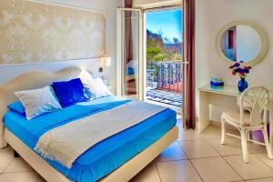 Postel nebo postele na pokoji v ubytování Mini Hotel - Angolo Di Paradiso -