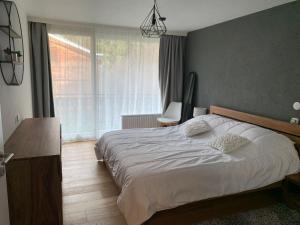 Postel nebo postele na pokoji v ubytování Modern and comfortable apartment with sauna!