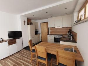 Kuchyňa alebo kuchynka v ubytovaní Appartement Falkner Manuel