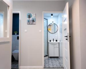 Kúpeľňa v ubytovaní Apartament Skandynawski