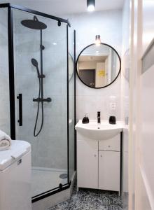 Kúpeľňa v ubytovaní Apartament Skandynawski