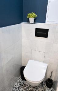 Kúpeľňa v ubytovaní Apartament Skandynawski