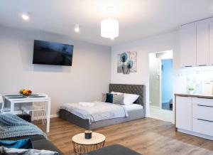 Posteľ alebo postele v izbe v ubytovaní Apartament Skandynawski