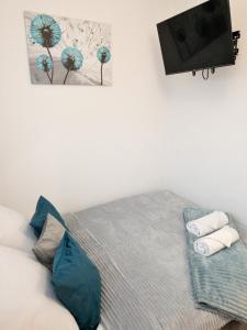 Posteľ alebo postele v izbe v ubytovaní Apartament Skandynawski