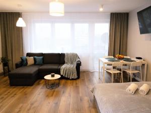 Zona d'estar a Apartament Skandynawski