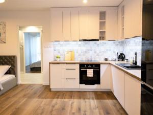 Kuchyňa alebo kuchynka v ubytovaní Apartament Skandynawski