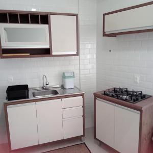 Køkken eller tekøkken på Linda casa com jacuzzi e churrasqueira privada para temporada