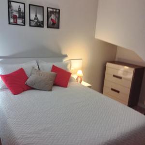 En eller flere senge i et værelse på Linda casa com jacuzzi e churrasqueira privada para temporada + 12 billeder